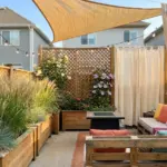 low-cost backyard privacy hacks for small properties with planters screens curtains and layered DIY backyard privacy ideas