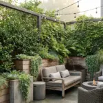 Living wall fence backyard privacy screen with climbing plants, trellis, and modern garden seating